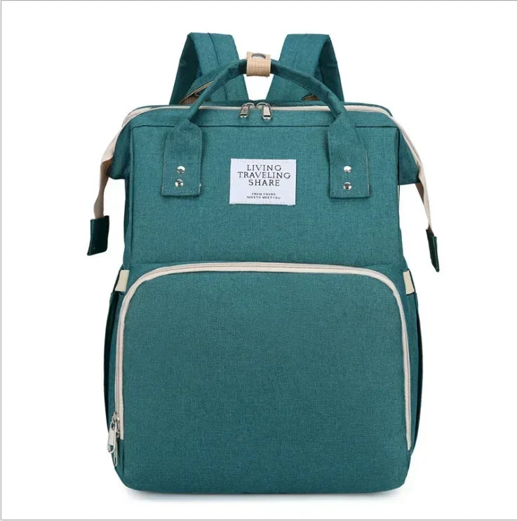 Mochila cambiador para bebé verde