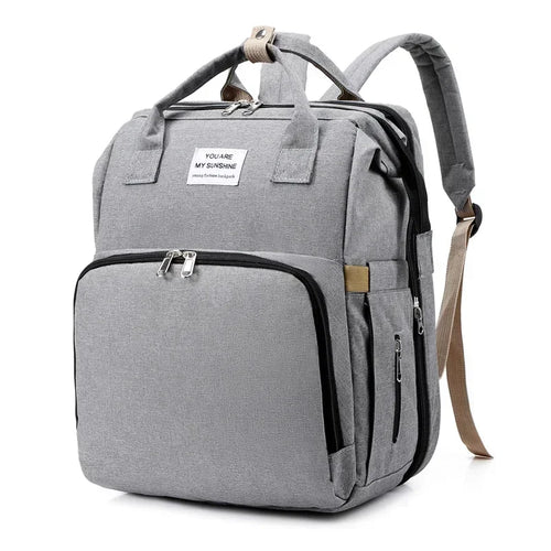 Mochila cambiador para bebé gris