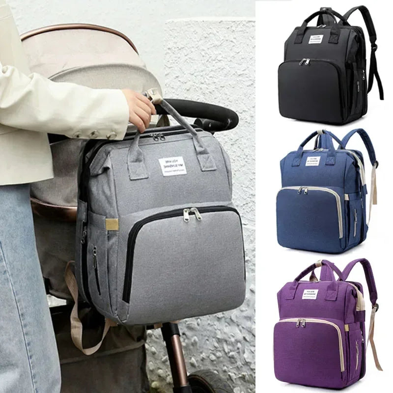 Mochila cambiador colgada del carrito del bebé